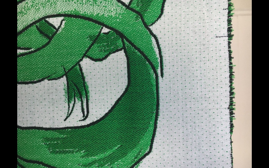 Detalje fra broderet kunstværk